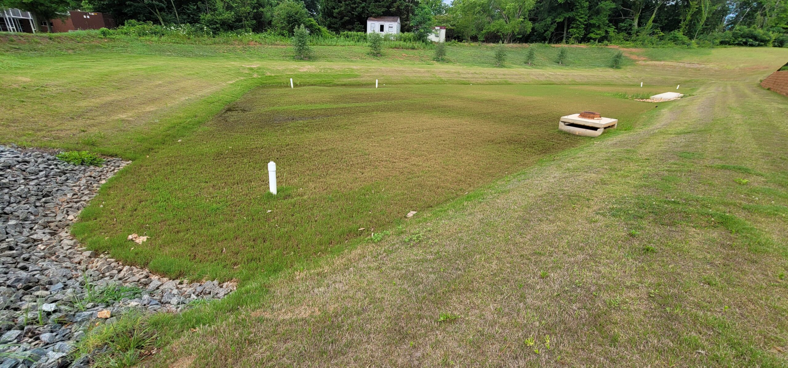 Stormwater control measure bioretention basin providing stormwater treatment and runoff control at a commercial site in North Carolina