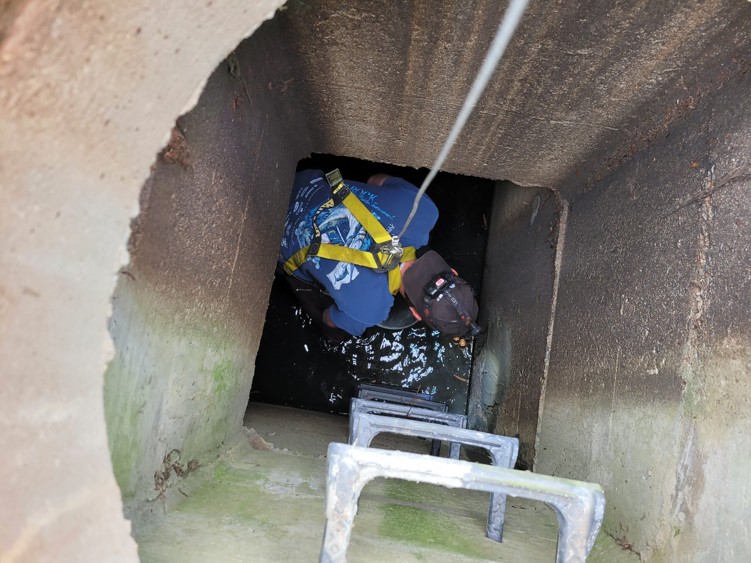Confined space entry for maintenance in stormwater pipe with high sediment buildup