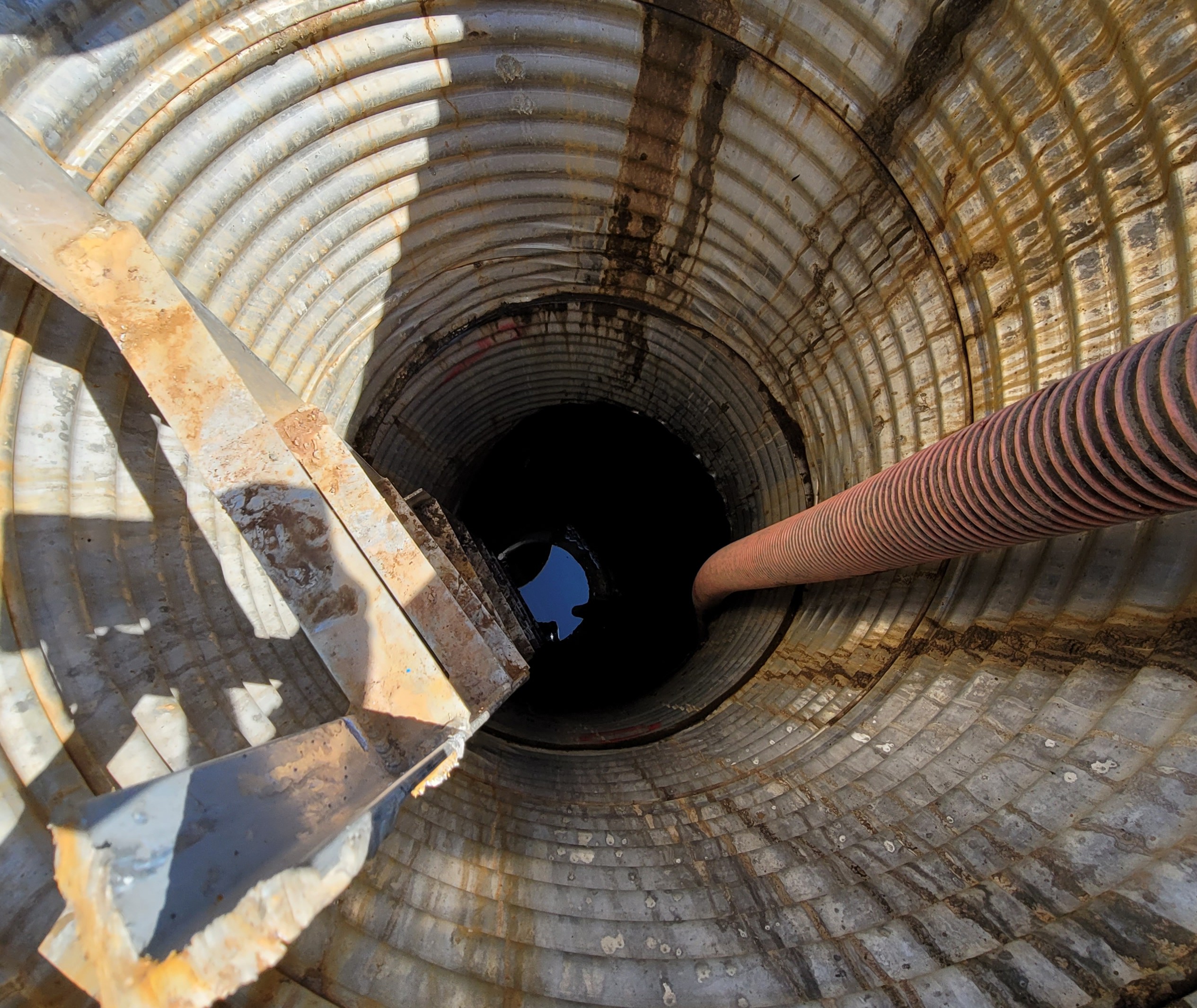 Vactor truck cleaning above and underground stormwater devices including catch basins, storm drains, vaults, and chambers.