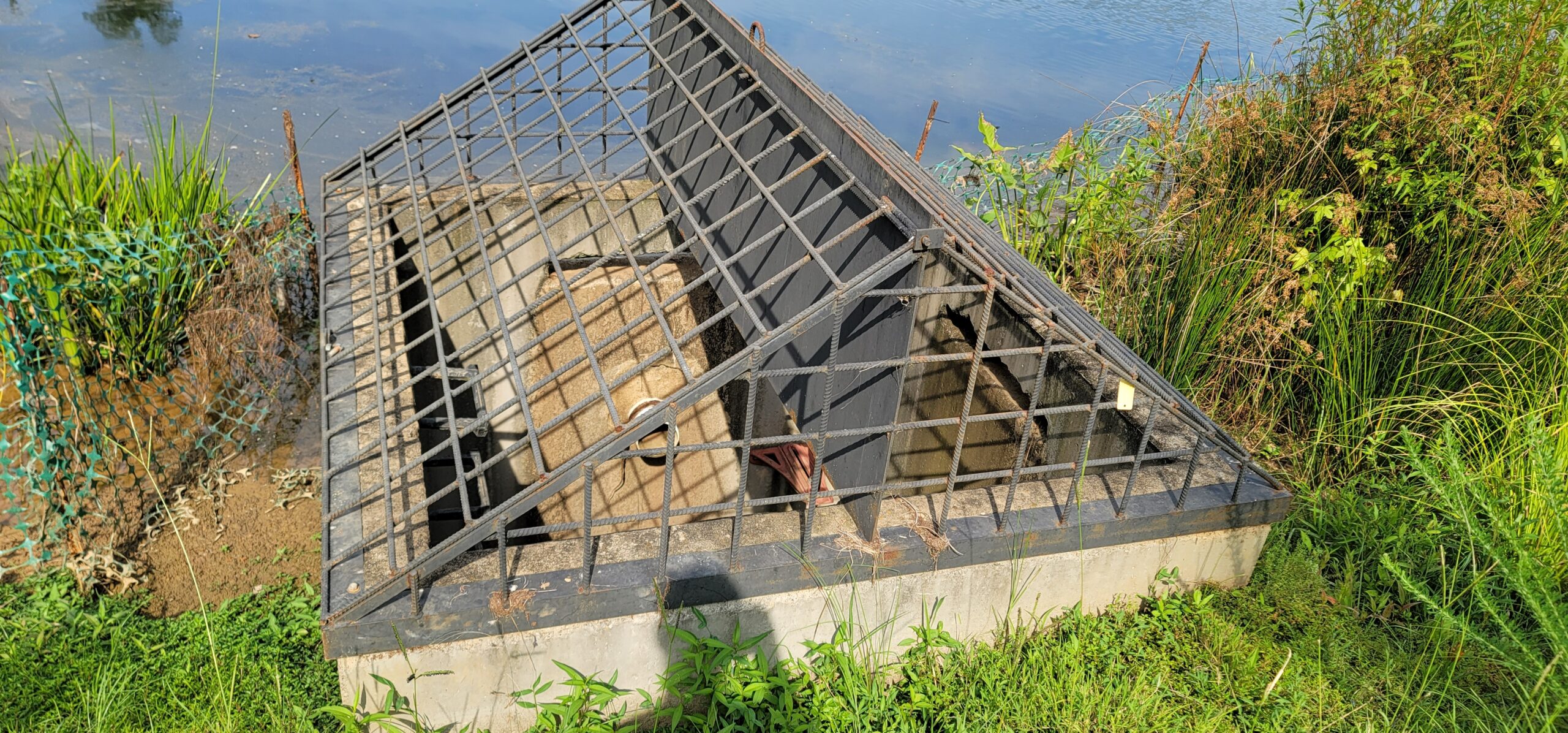 Annual stormwater inspection of retention basin and storm drain infrastructure with documented compliance checklist.