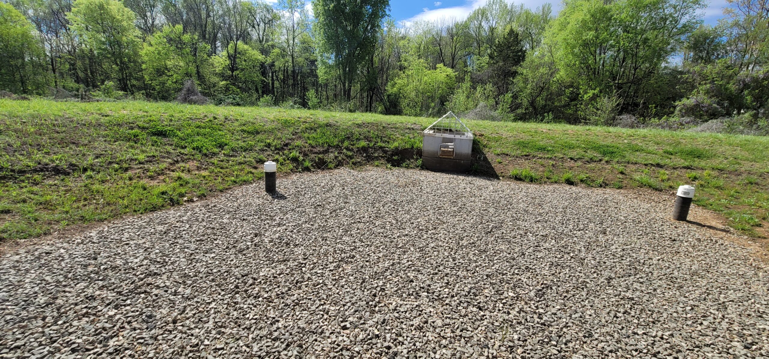Stormwater inspection of detention pond, outlet structure, and drainage system for regulatory compliance.