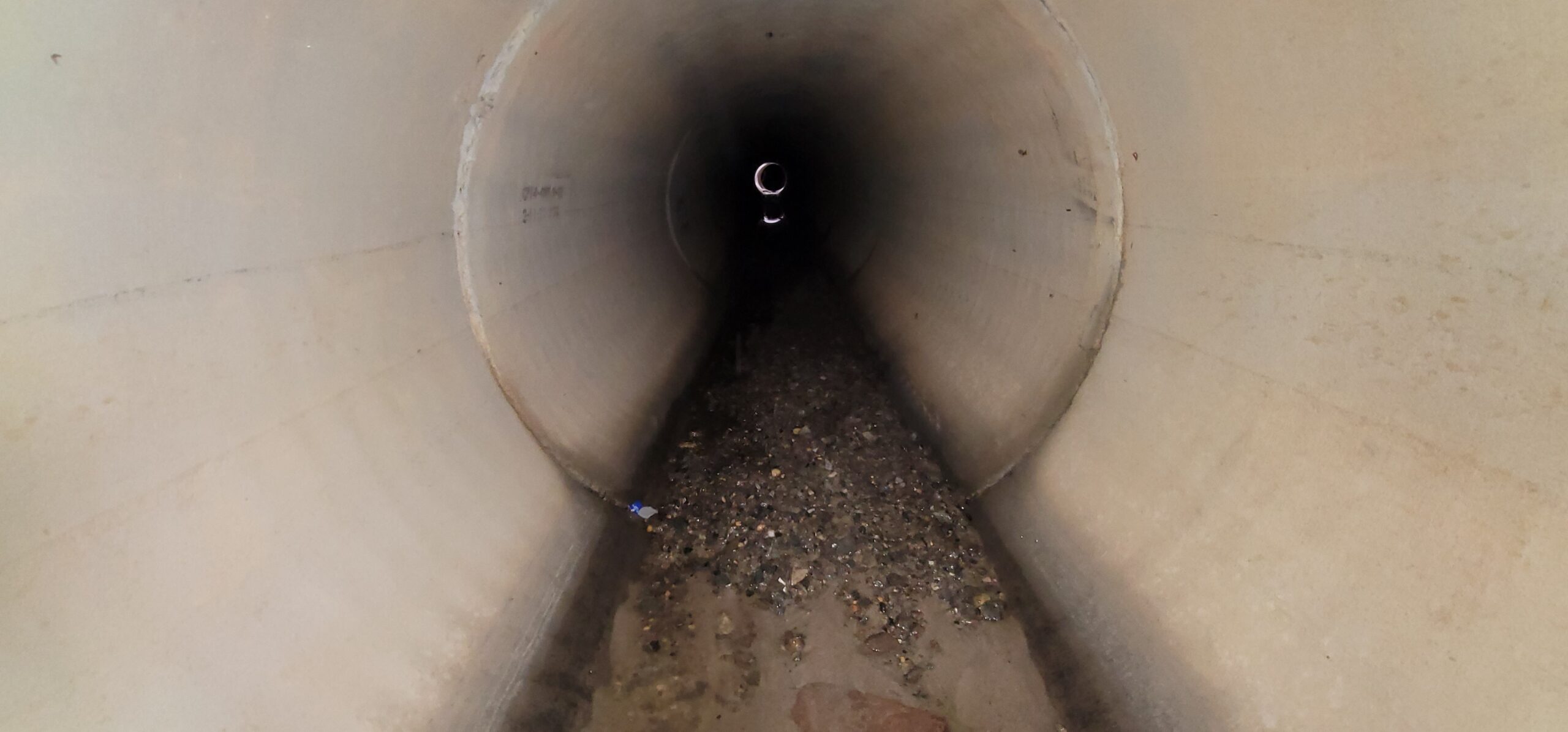 CCTV camera inspecting the interior of an underground stormwater control measure (SCM) vault for blockages and structural issues.