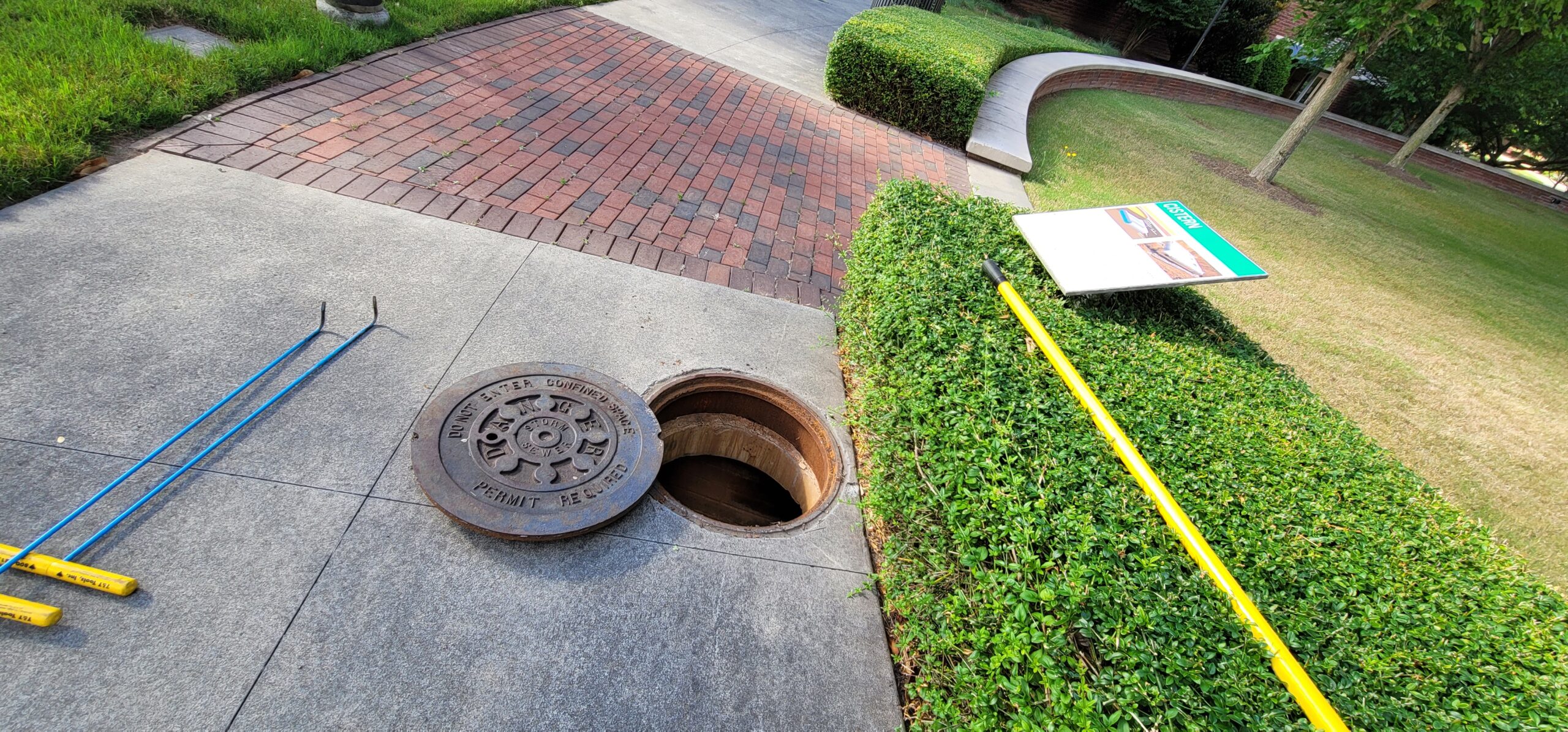 Rainwater harvesting cistern system capturing and storing rooftop runoff for reuse at a college campus.