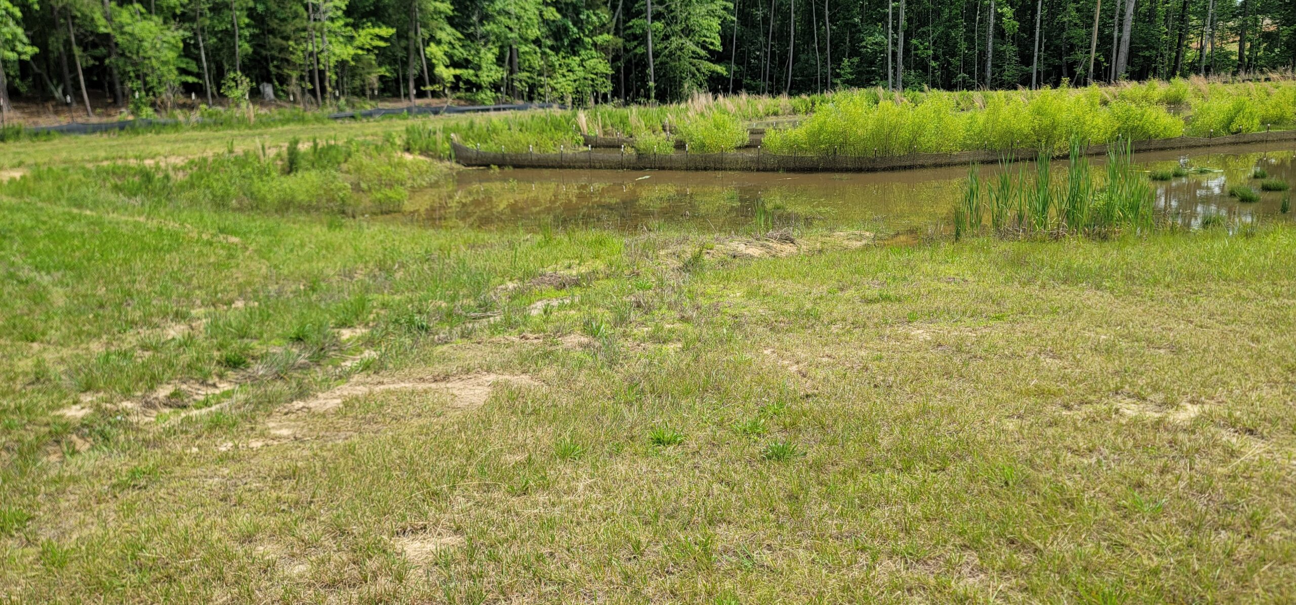 Vactor truck cleaning a trench drain to remove debris and restore proper stormwater flow.
