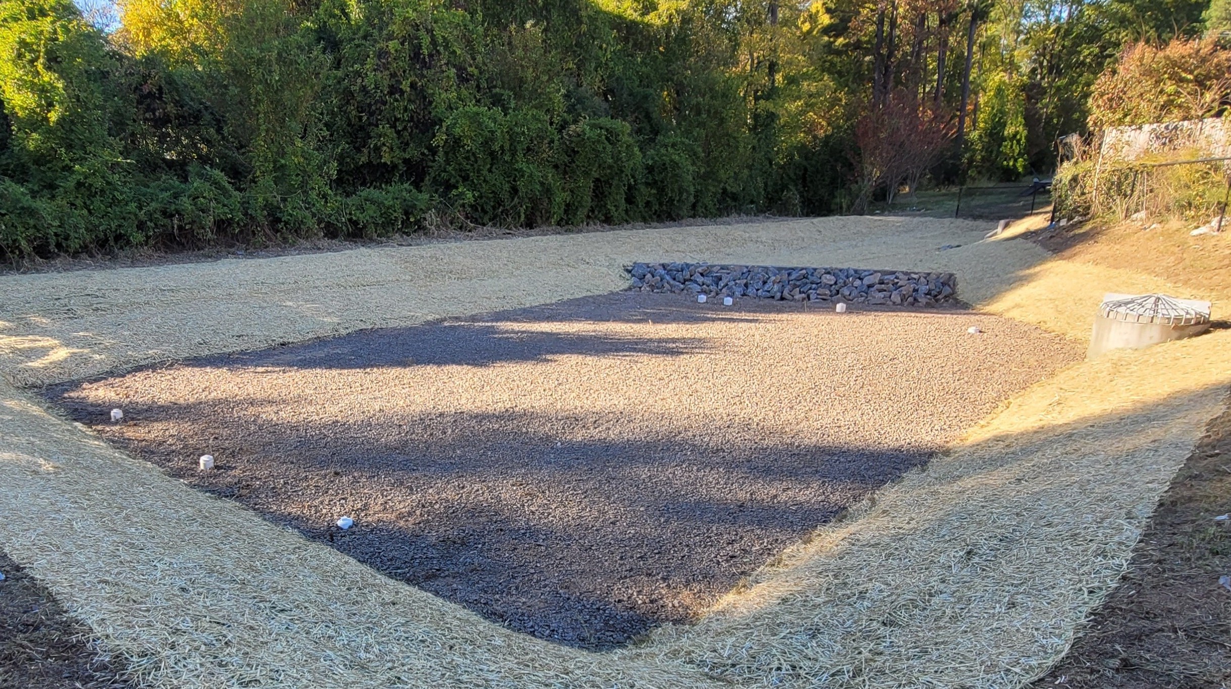 Stormwater conversion project integrating improved BMPs for a commercial site